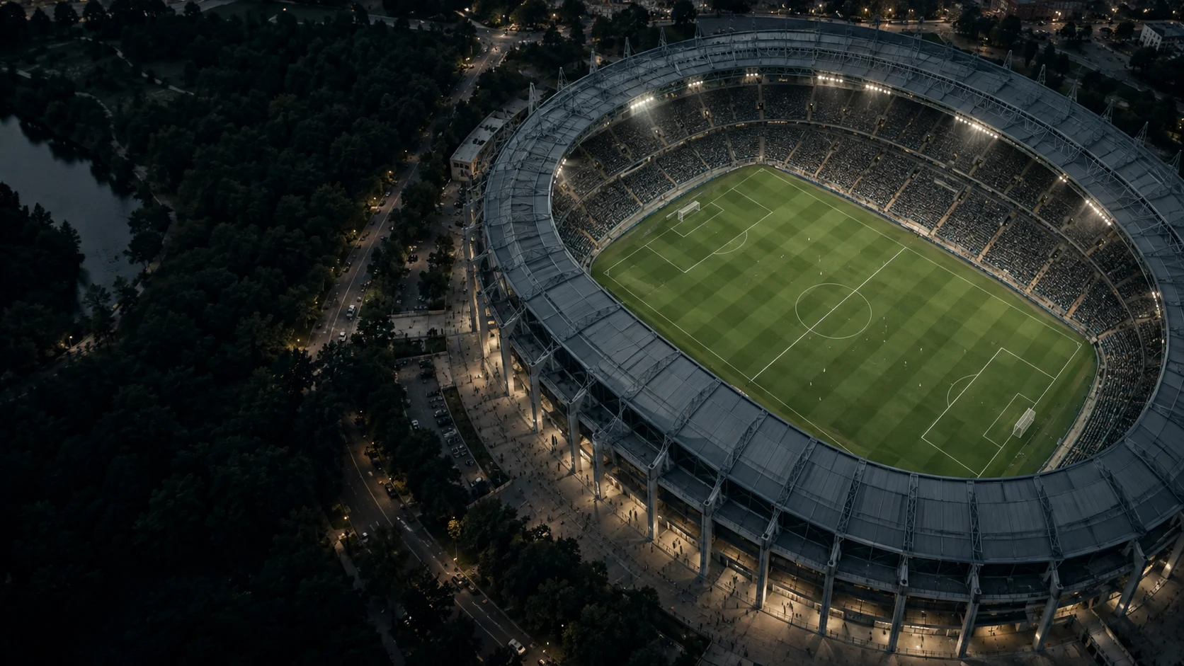 An aerial view of a football stadium at dusk